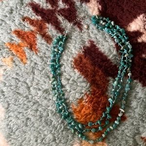 Gorgeous multi strand hand knotted turquoise stone bead necklace
